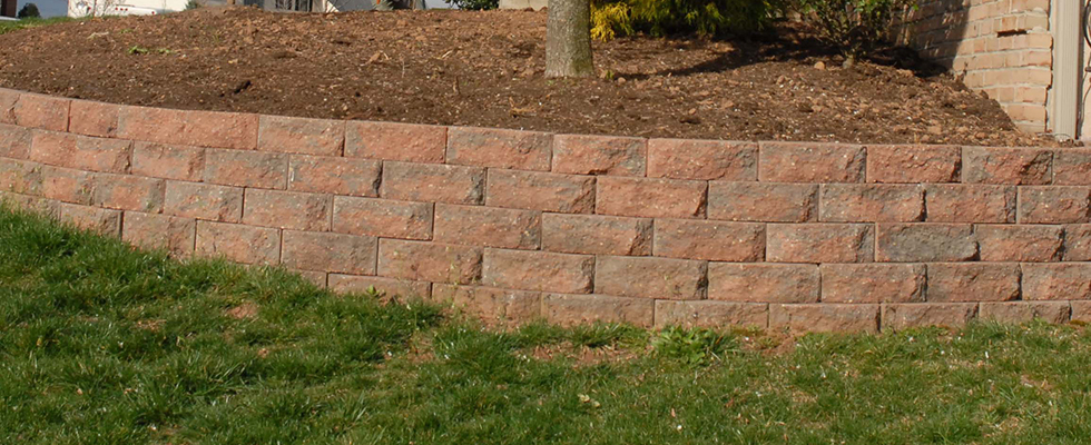 Retaining Walls In Brookfield WI Will Support Sloped Land And Define Outdoor Areas