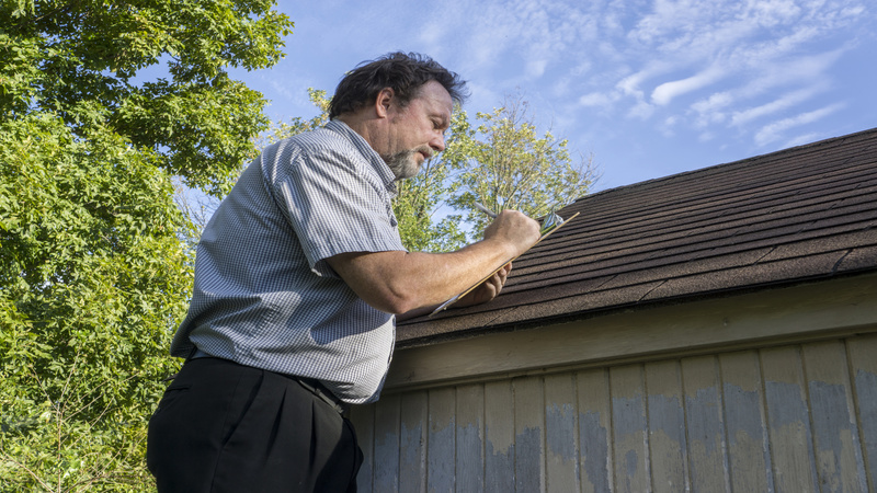 Check Roofing Services in Ann Arbor, MI About an Ice Dam Treatment